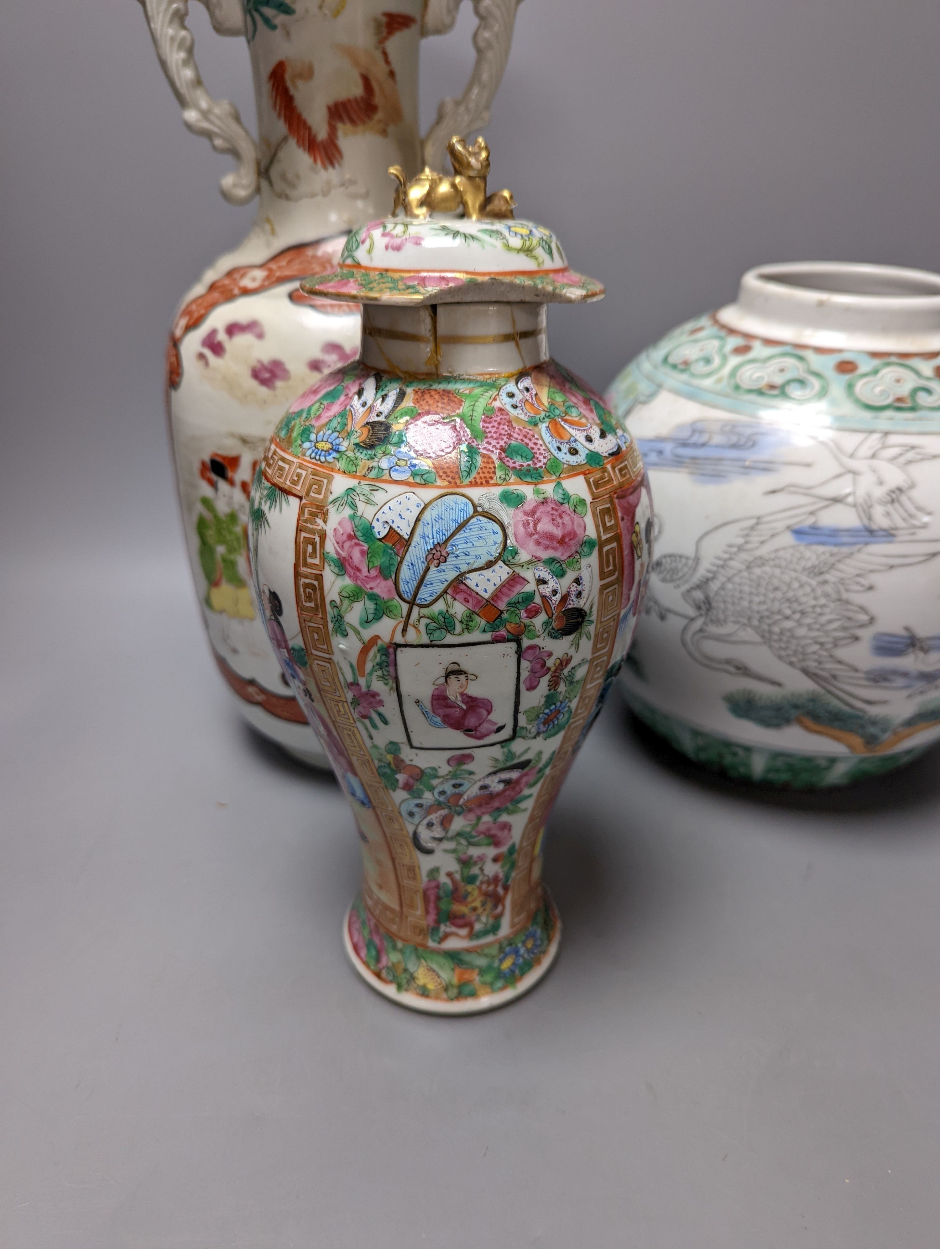 A Chinese famille rose vase and two ginger jars, together with a Japanese vase, 38cm